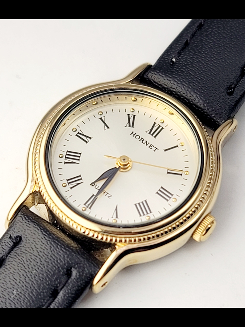 Vintage Hornet HN-012 Women’s Gold Tone Roman Numeral Japan Quartz Dress Watch